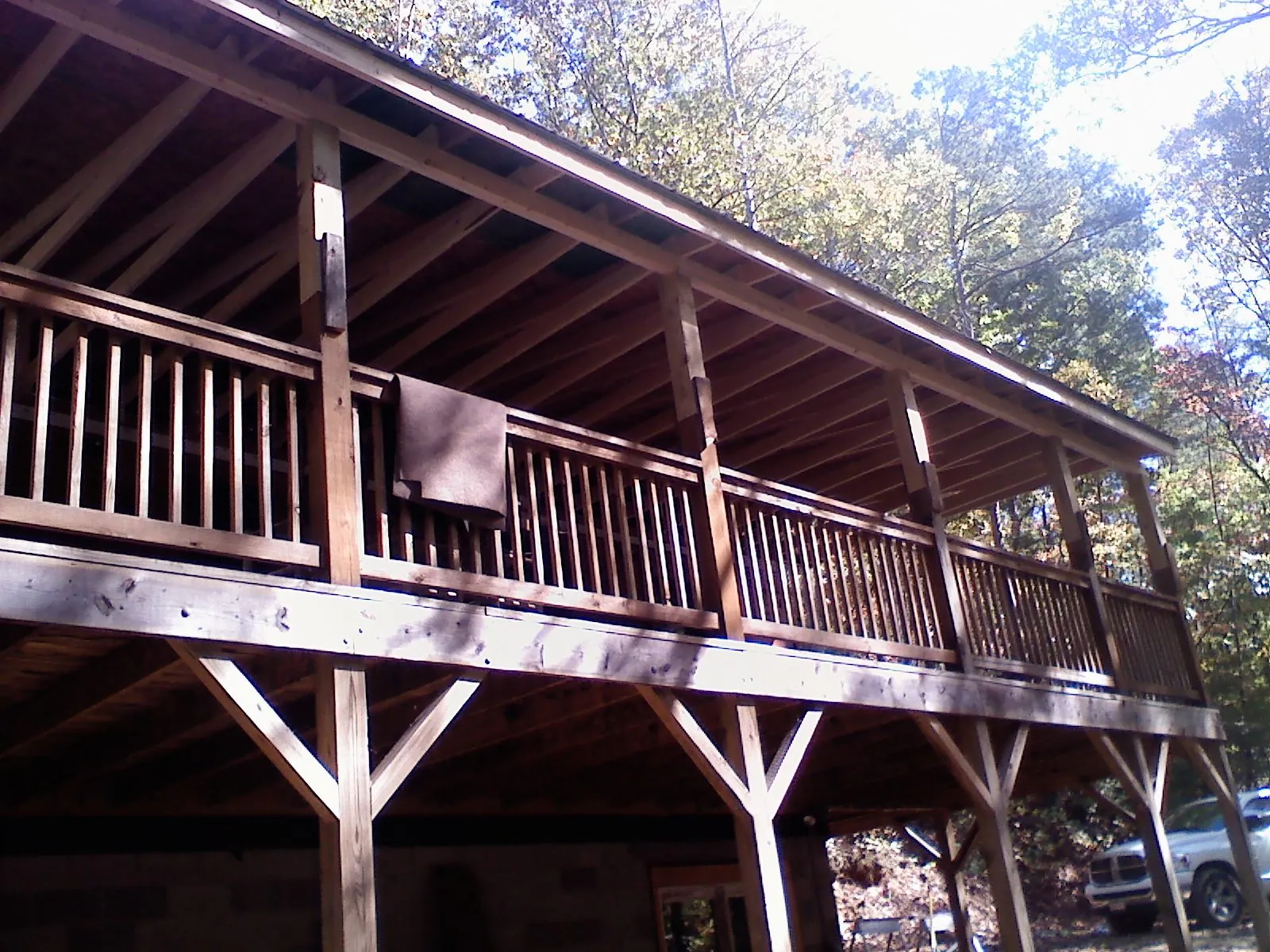 Timber framing under a new elevated porch and deck — Roof Leak Repair in Myton by Roofing Brothers